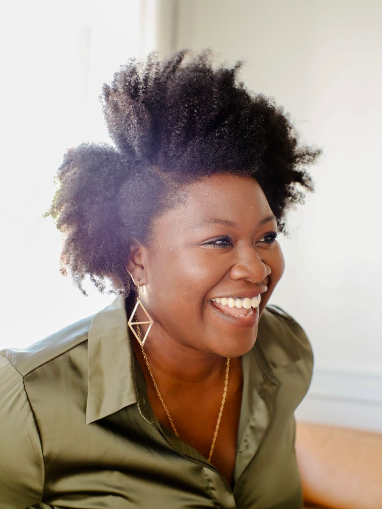 a head shot of a female author that is laughing